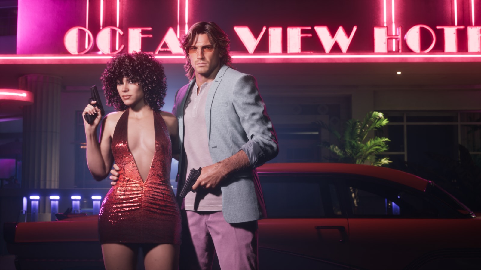 Jason and Lucia in retro outfits at night outside the neon lit Ocean View Hotel